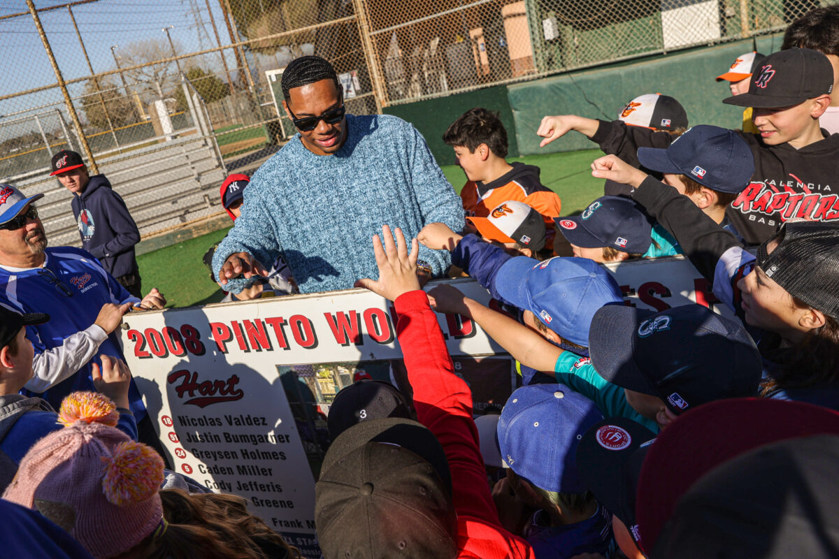 MLB’s Hunter Greene gives free cleats and spikes to local kids