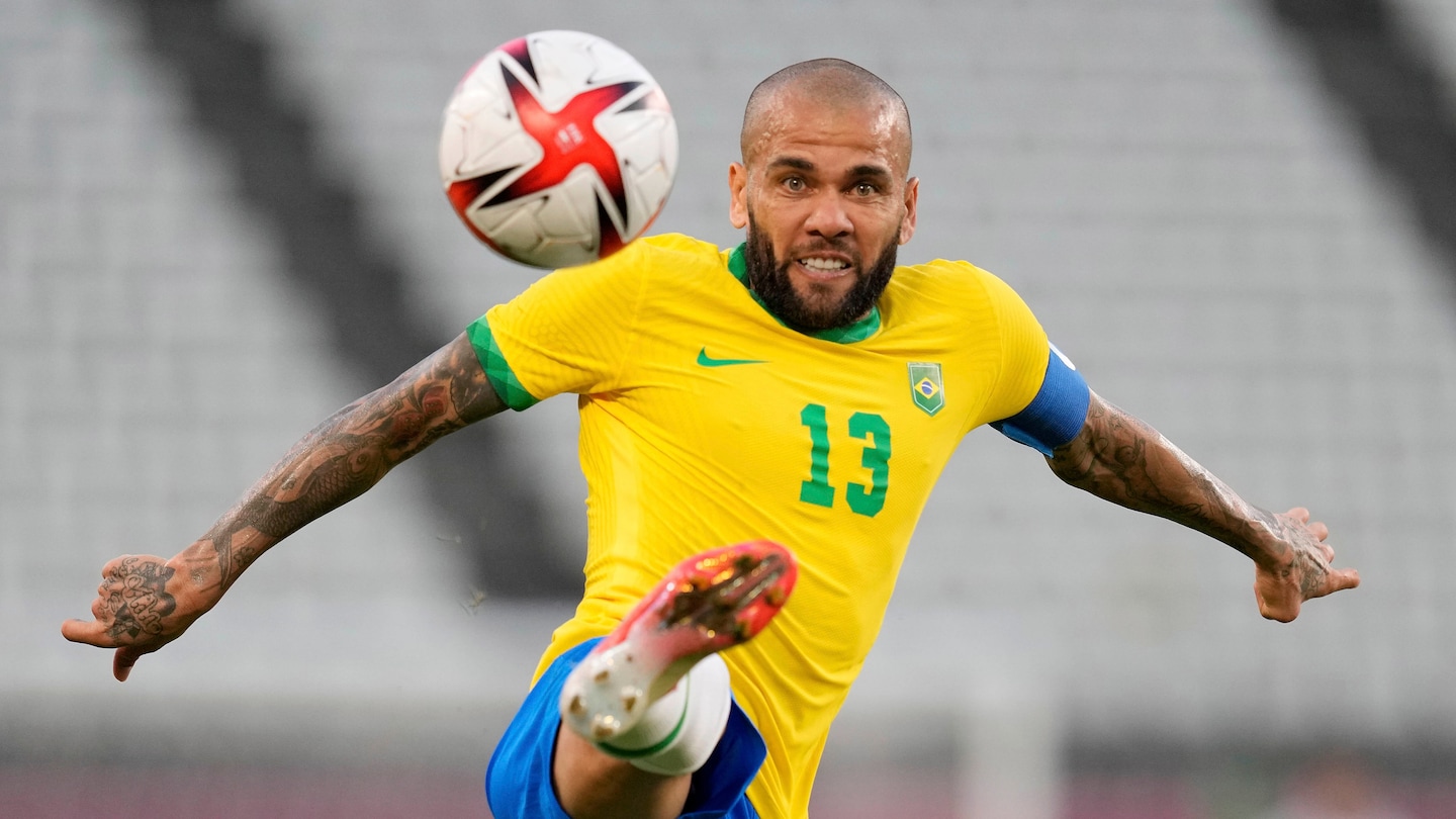 Brazilian footballer Dani Alves charged with sexual assault in Spain