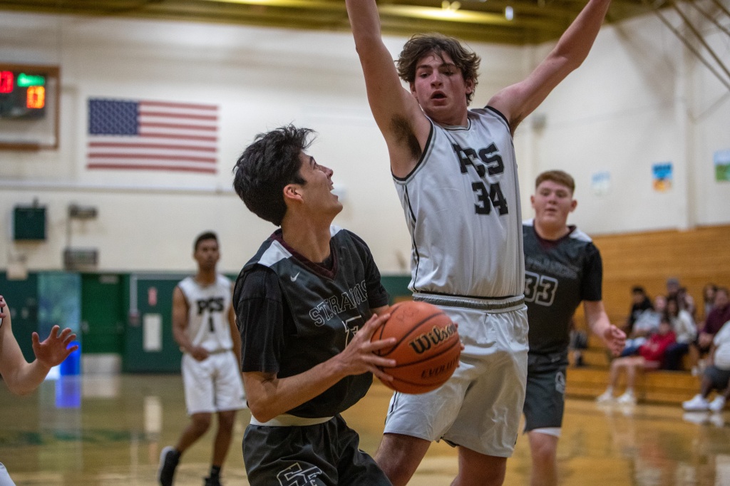 Sam Browne keeps the heat on the St. Francis basketball team