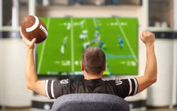 guy watching TV for NFL player prop bets