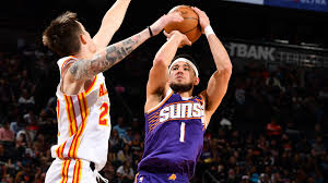 Win Streaks Collide: Booker and Johnson Duel in Phoenix Showdown!
