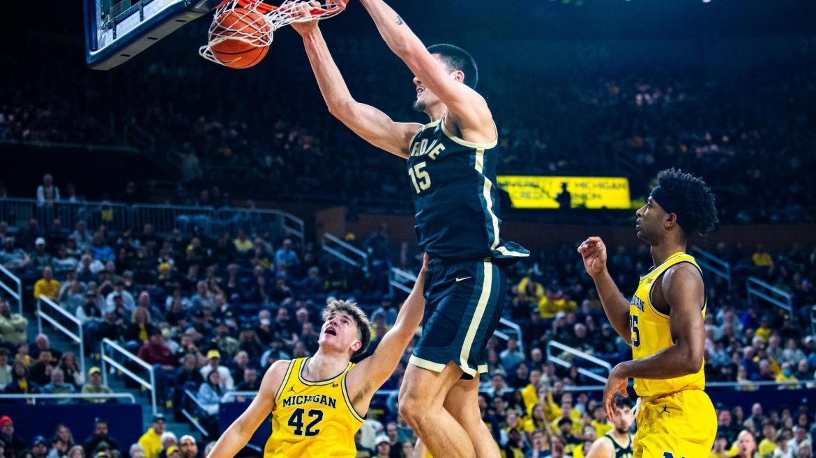 The Big Ten Crown on the Line: Wolverines and Boilermakers Battle for Supremacy.