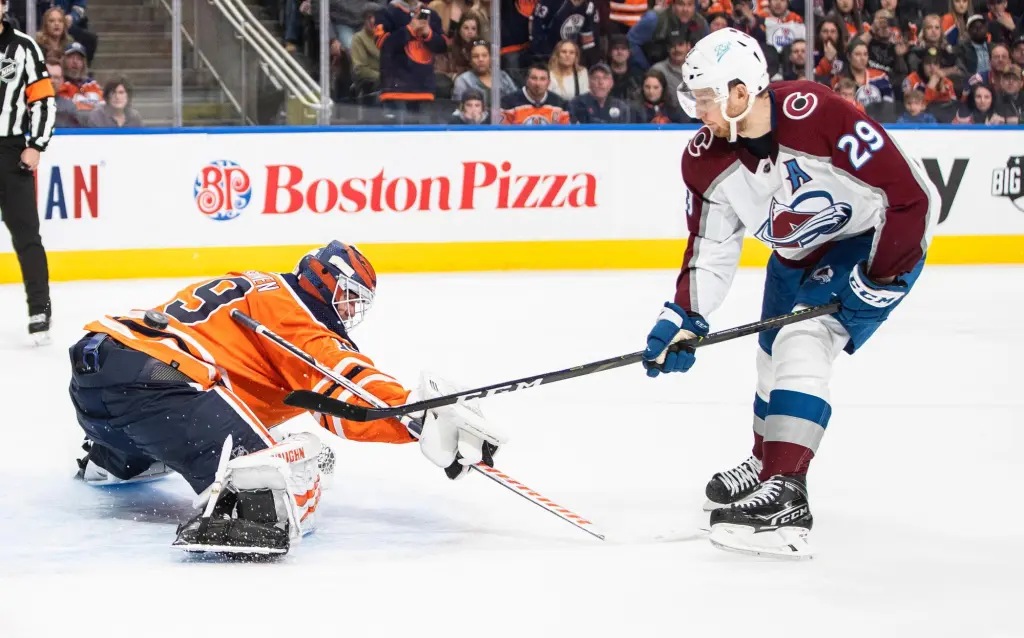 The Pursuit of 53: Can the Hobbled Oilers Stop MacKinnon’s March to History?